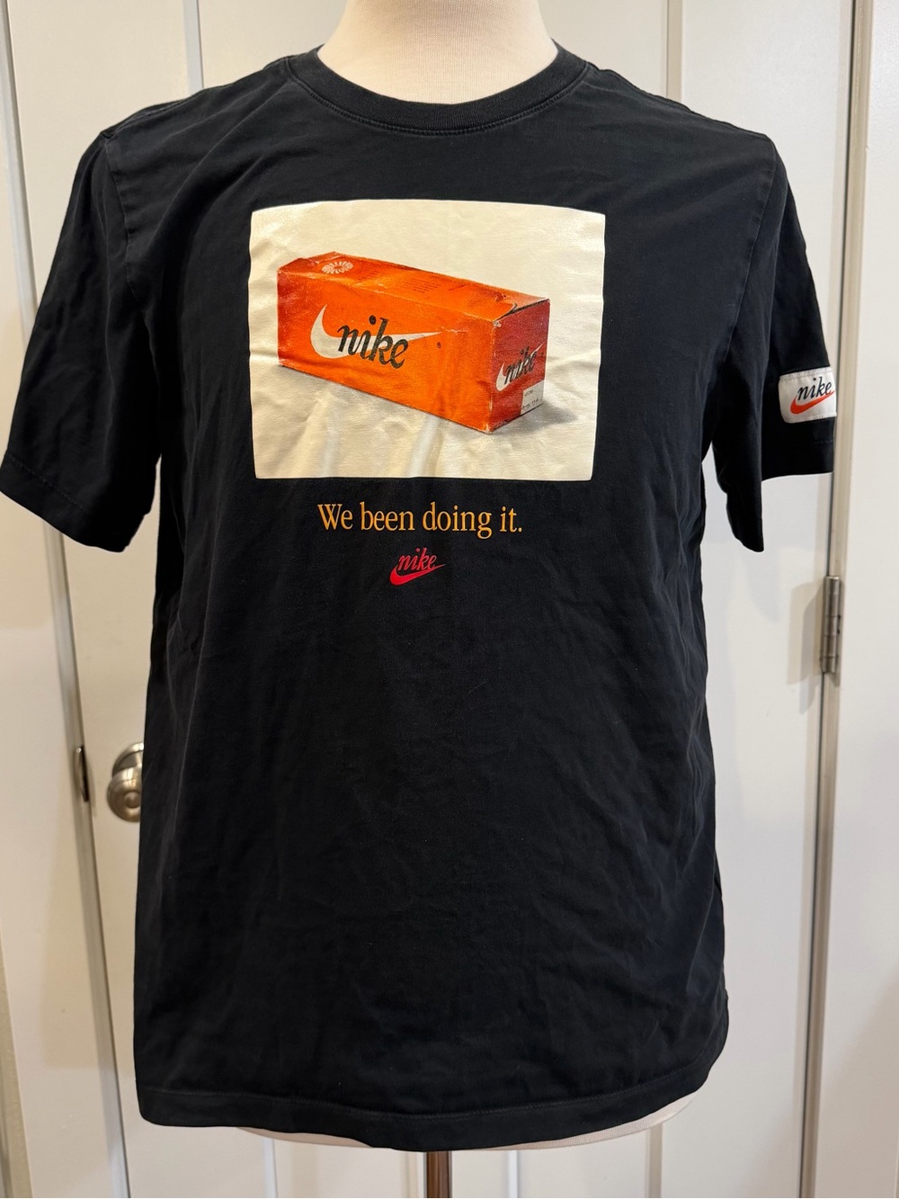 Nike Men’s Black Short-Sleeve Tee with Orange Box Graphic